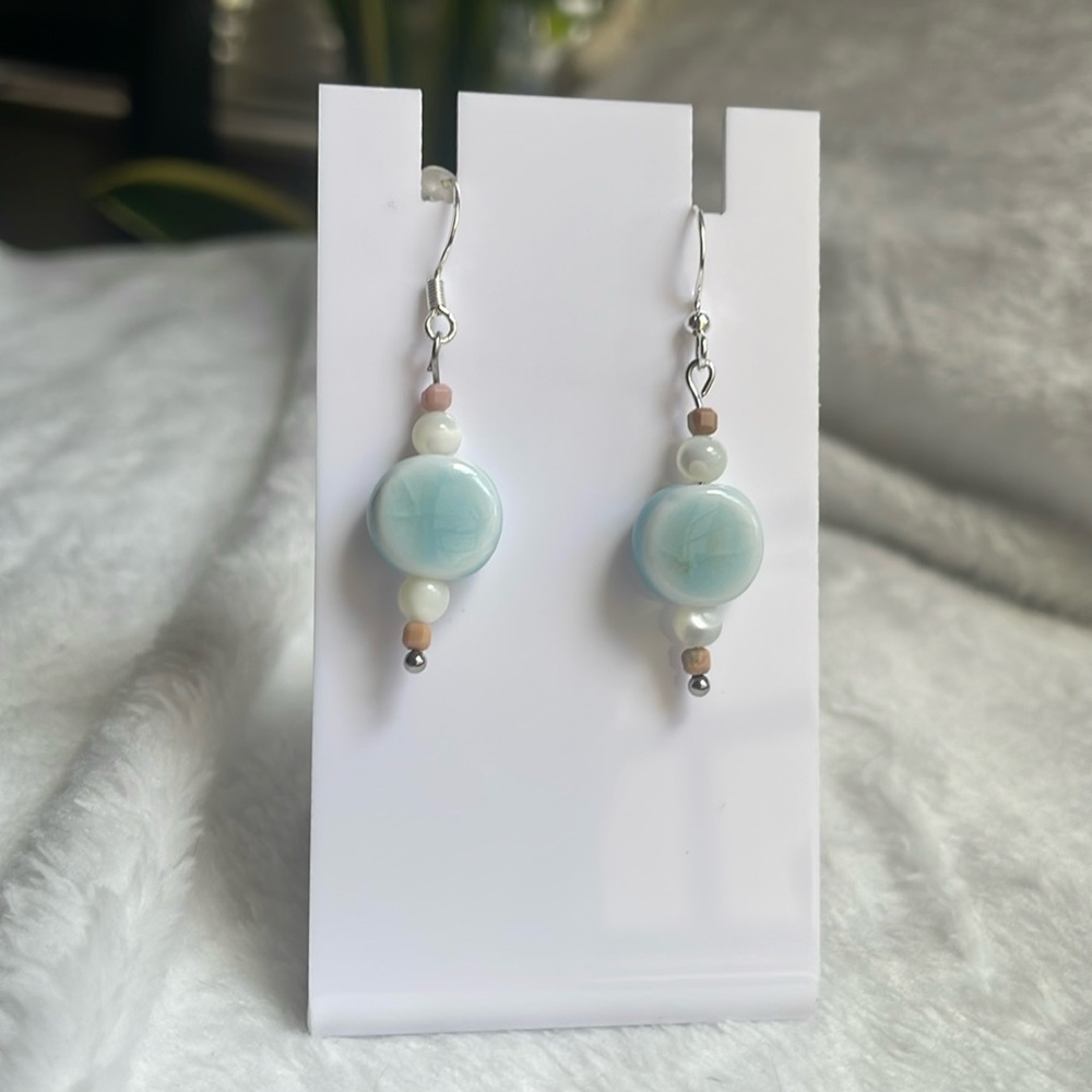 Delicate light blue ceramic beaded earrings with 925 silver hooks